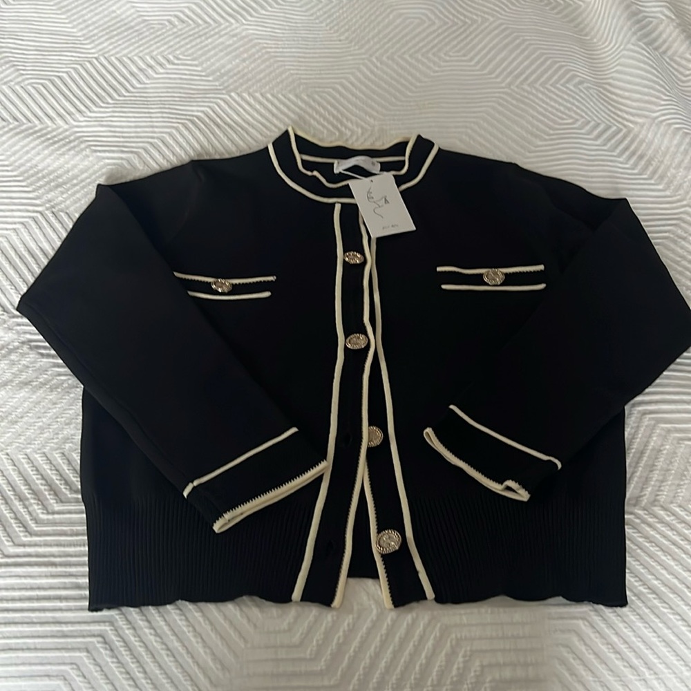 Woman’s sweater size small